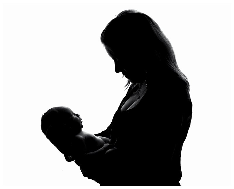 sillouette of mom and baby.jpg Buffalo Newborn Photographer.jpg