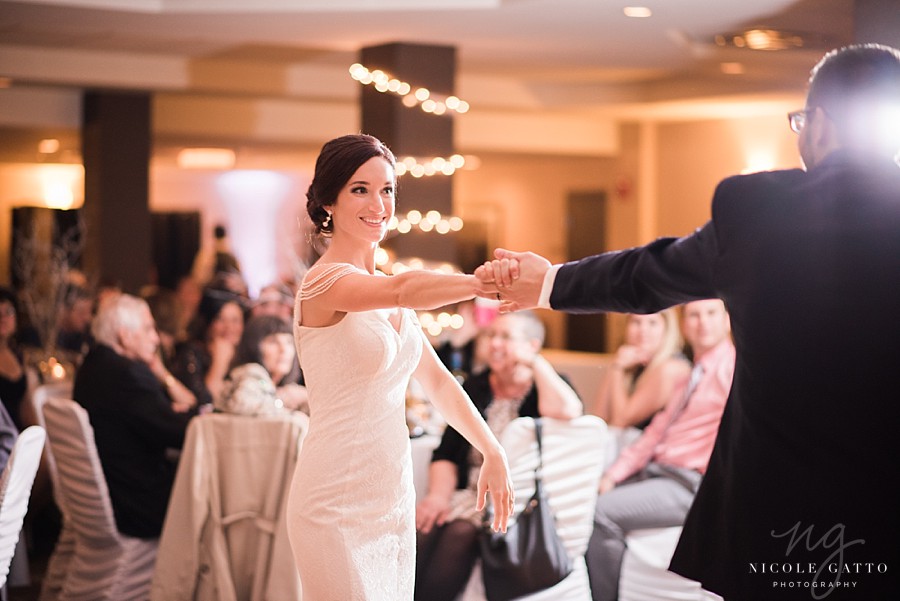 Wedding_Photography_Buffalo_NY_0027.jpg bride and grooms first dance by buffalo wedding photographer