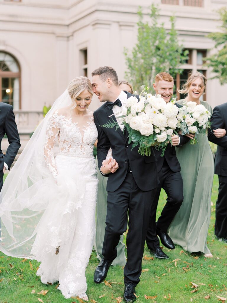 Wedding photographer in buffalo ny bride and groom walking together